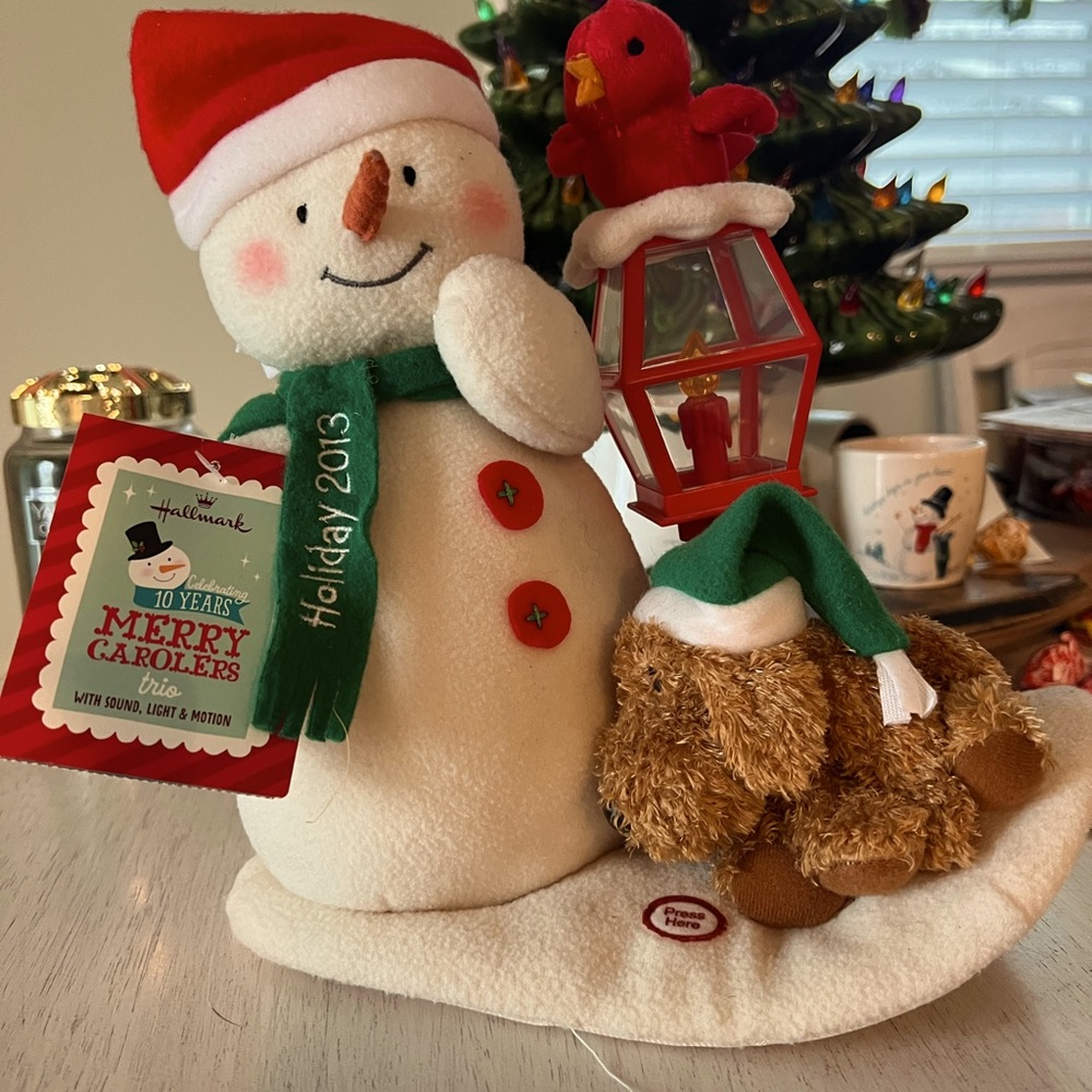 Hallmark 2013 "Merry Carolers" animated, musical plush ornament.